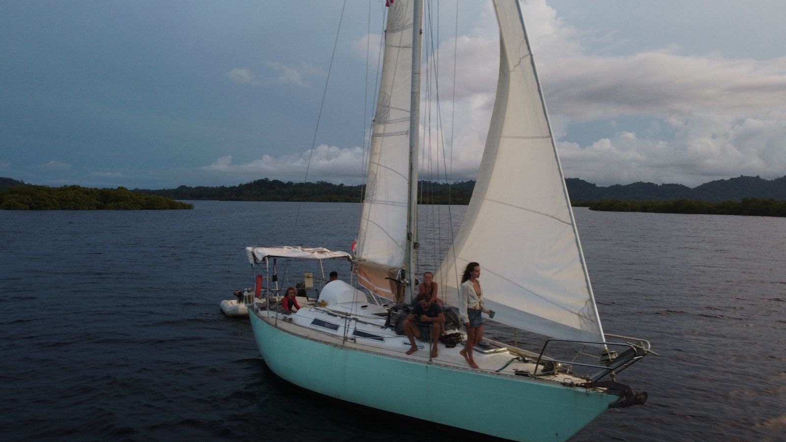 The boat anchored in the mangroves